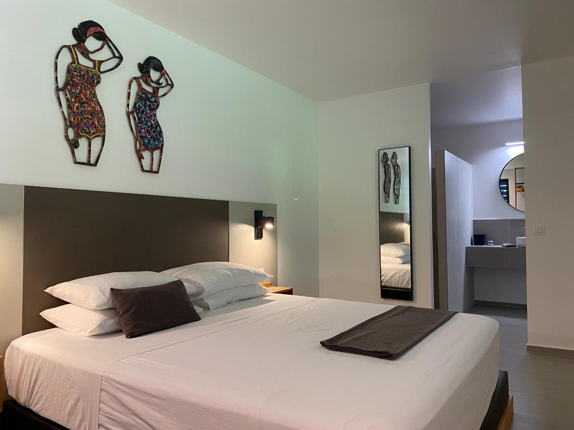 Hotel Lune De Miel Десе Стая снимка